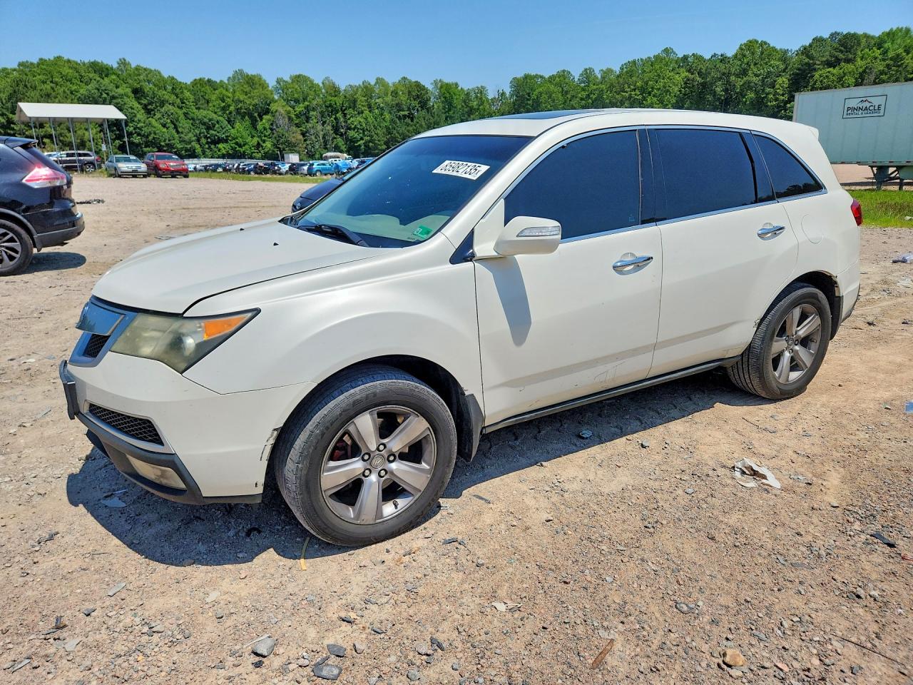2011 Acura MDX, VIN 2HNYD2H2XBH534804 — Side
