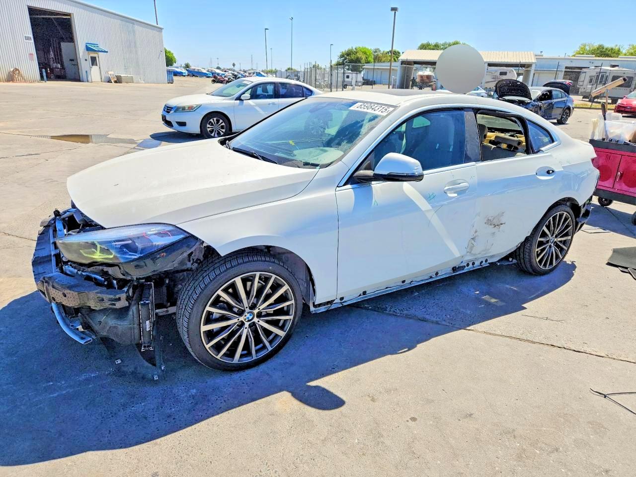 2021 BMW 2 Series 228i xDrive, VIN WBA73AK00M7G52204 — Side