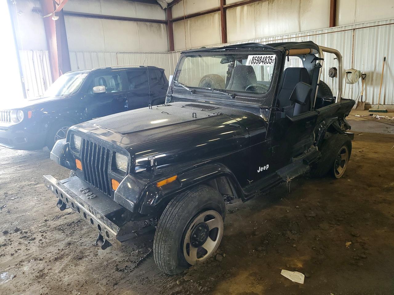 1993 Jeep Wrangler Sahara, VIN 1J4FY49S7PP202716 — Side