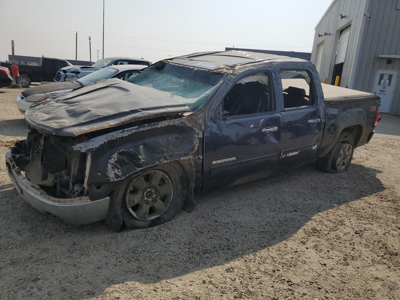 2011 GMC Sierra 1500 SLT, VIN 3GTP2WE30BG220378 — Vandalism
