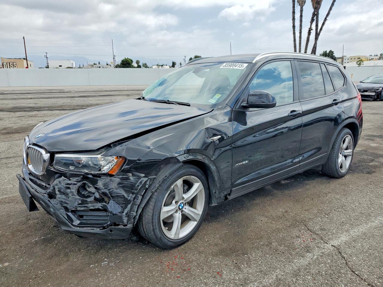 2017 BMW X3 xDrive28i, VIN 5UXWX9C30H0W70139 — Side