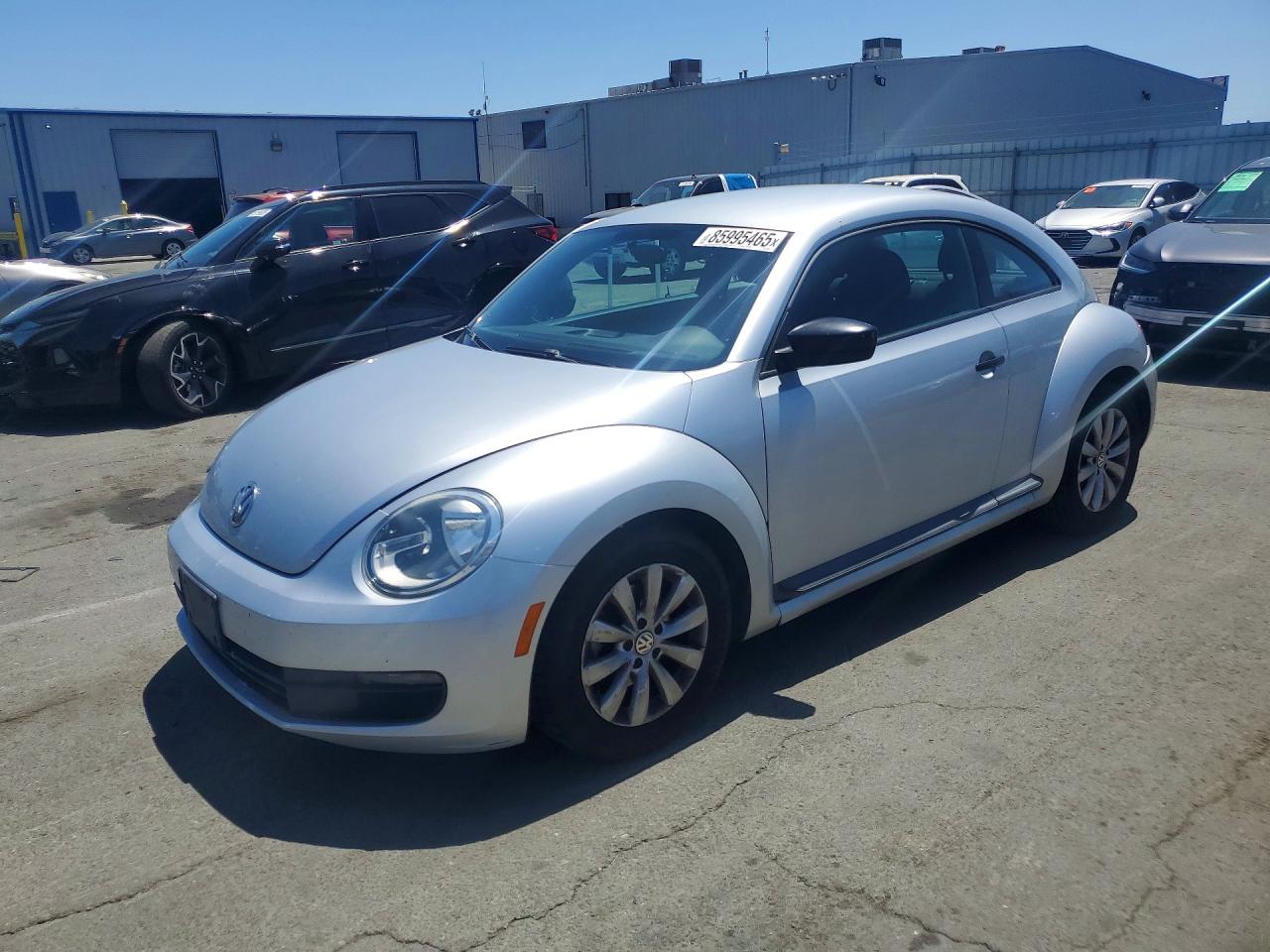 2013 Volkswagen Beetle 2.5L, VIN 3VWFP7ATXDM646878 — Minor dents and scratches