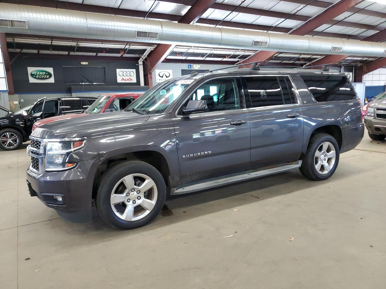 2015 Chevrolet Suburban LT, VIN 1GNSKJKCXFR164545 — Side