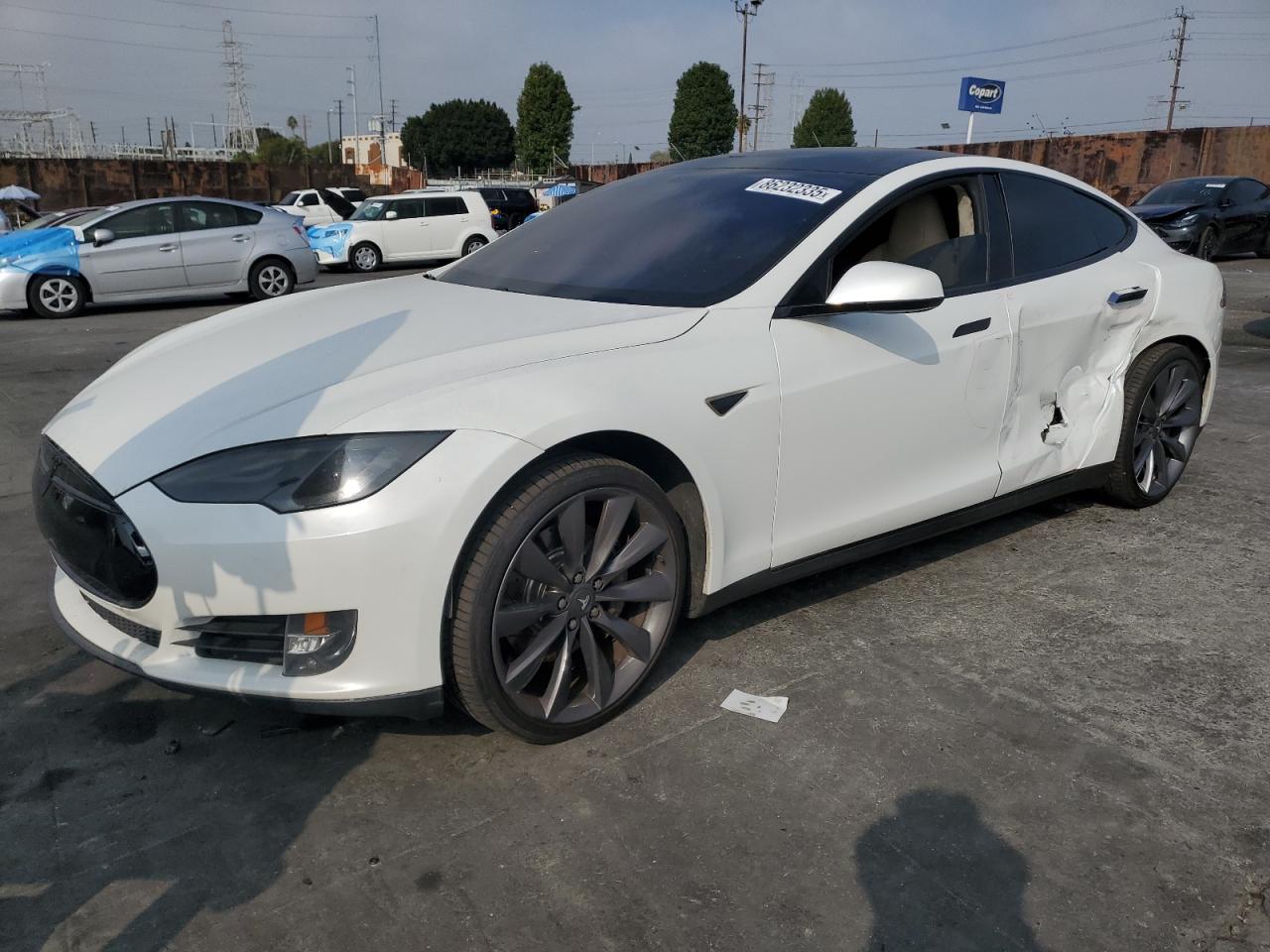 2012 Tesla Model S Performance, VIN 5YJSA1DP8CFS01024 — Бок