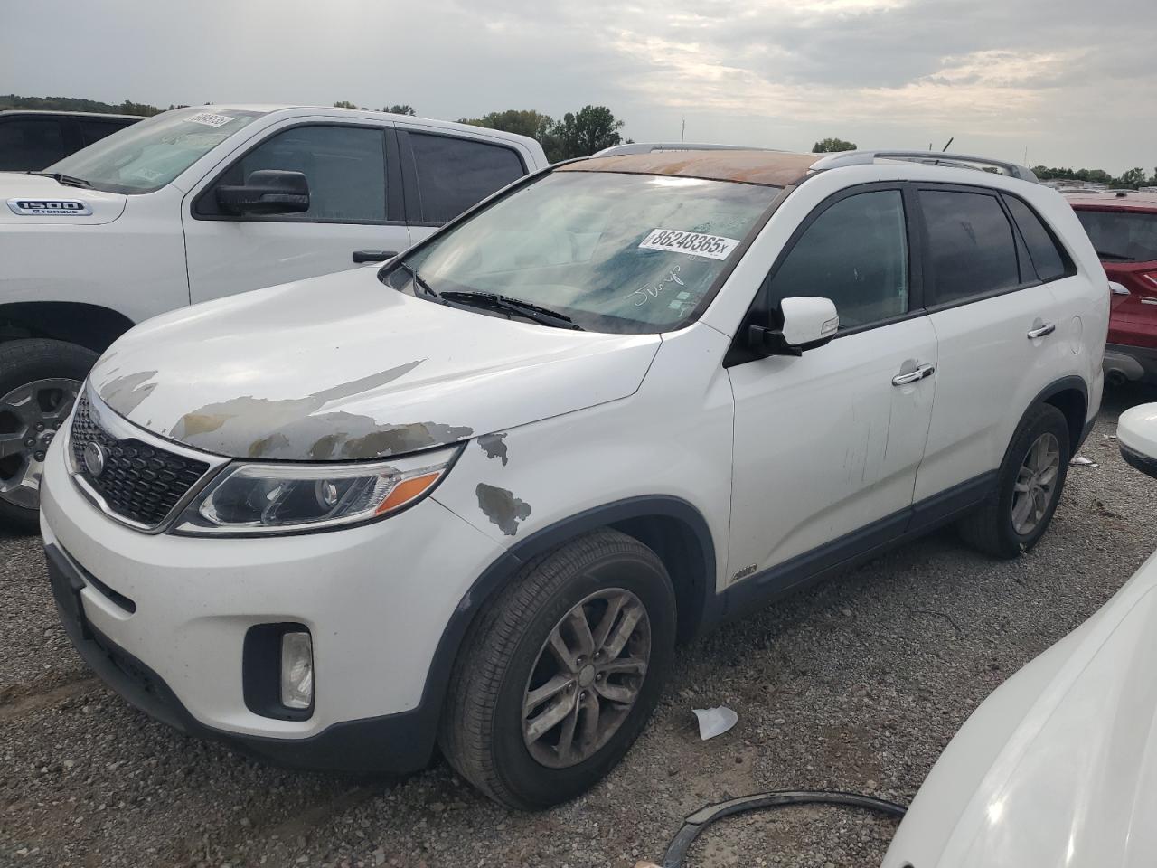 2015 Kia Sorento LX, VIN 5XYKTCA62FG561890 — Vandalism