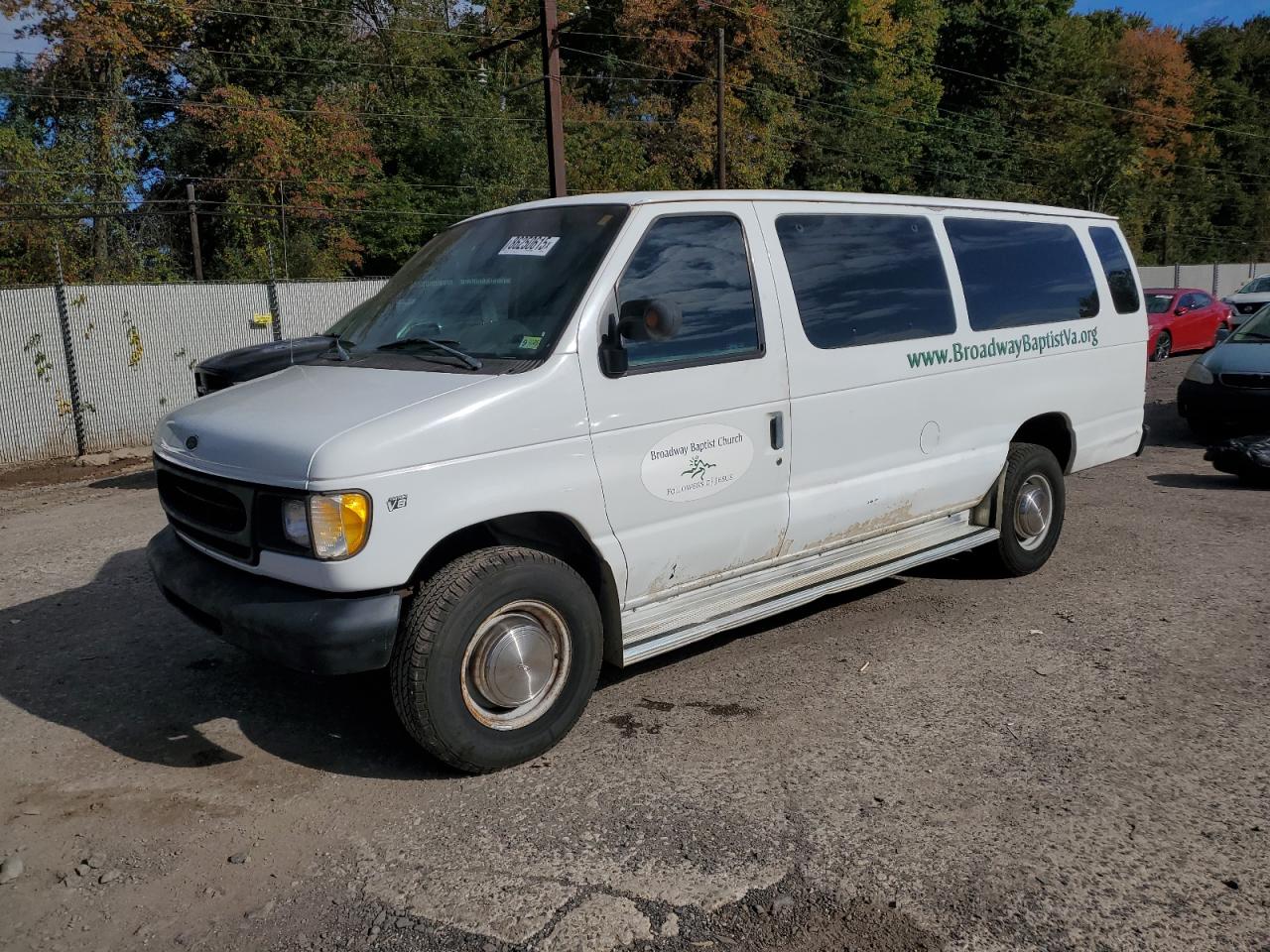 1998 Ford Econoline Wagon XL, VIN 1FBSS31LXWHA38976 — Normal wear