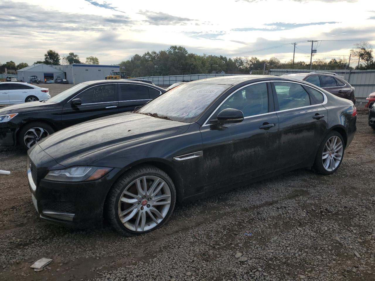 2016 Jaguar XF 35t Prestige, VIN SAJBK4BV4GCY14973 — Minor dents and scratches
