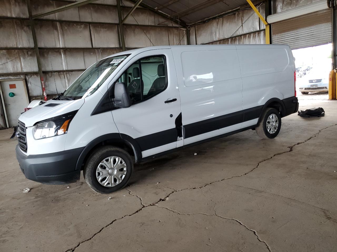 2018 Ford Transit Cargo, VIN 1FTYE2YM8JKB55019 — Minor dents and scratches