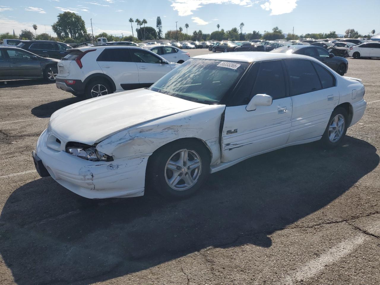 1999 Pontiac Bonneville SE, VIN 1G2HX52K1XH230723 — Front end