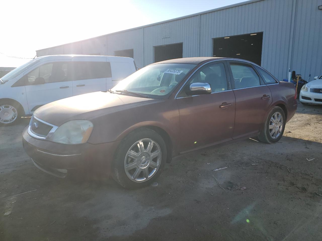 2007 Ford Five Hundred Limited, VIN 1FAHP25157G122422 — Side