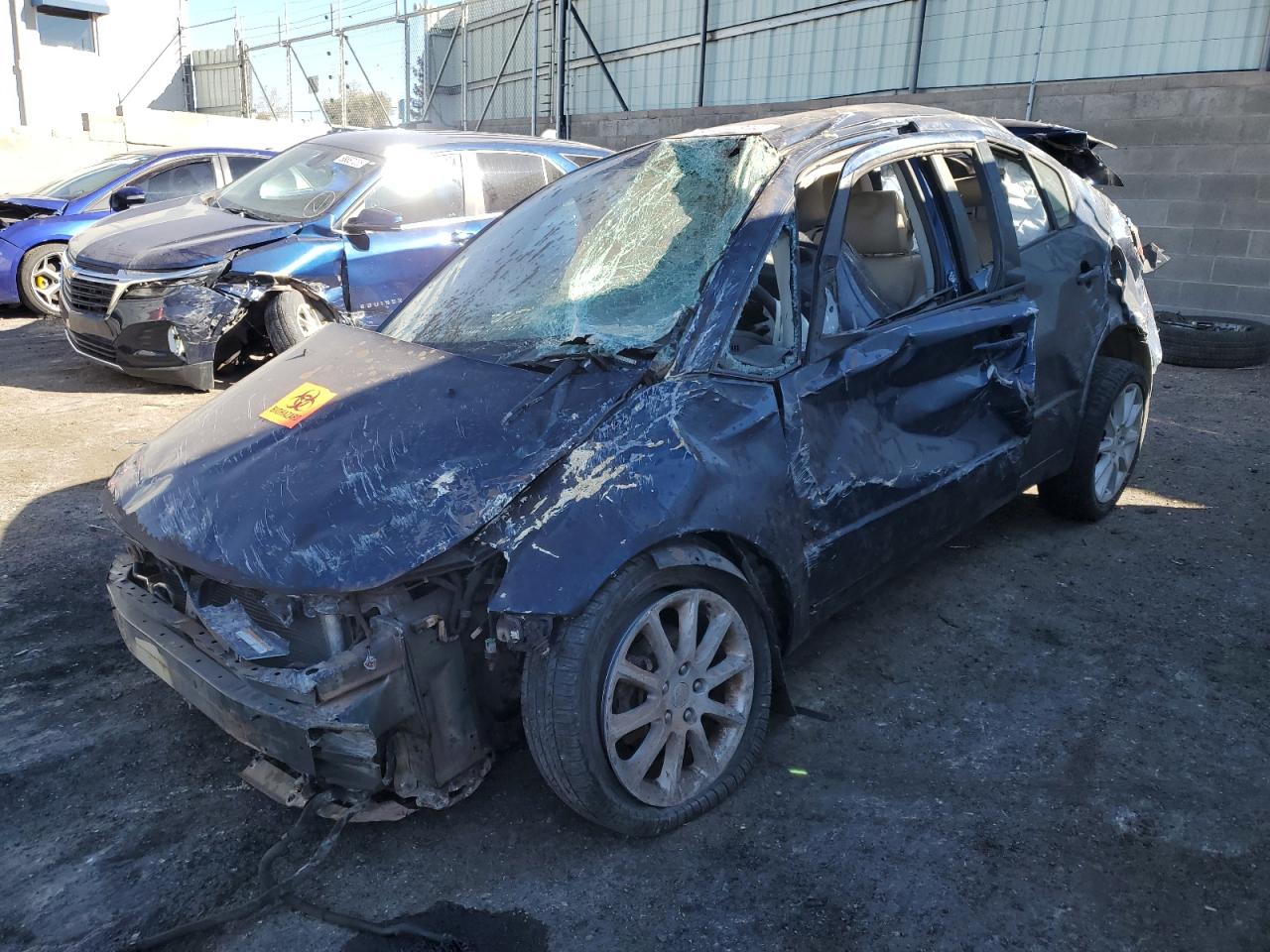 2011 Suzuki SX4 LE, VIN JS2YC5A23B6303111 — Rollover