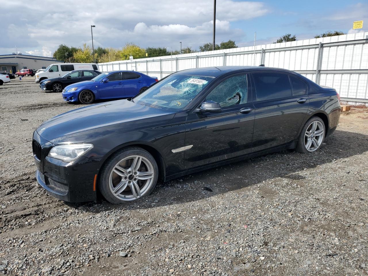 2015 BMW 7 Series 750Li, VIN WBAYE8C5XFD782333 — Ранее повреждён