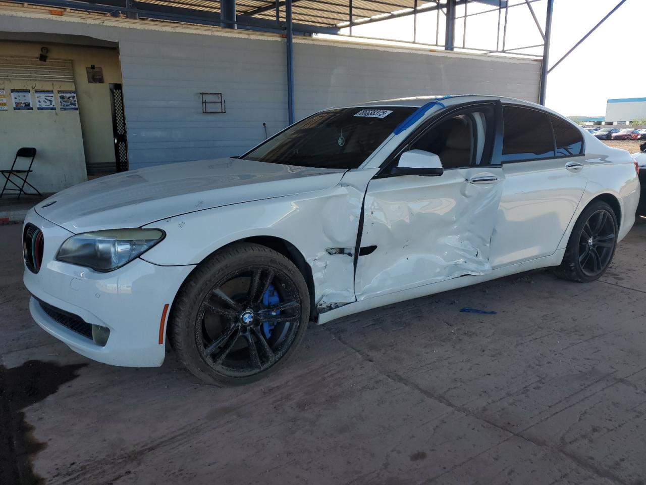 2011 BMW 7 Series 750i, VIN WBAKA8C53BCY37173 — Side