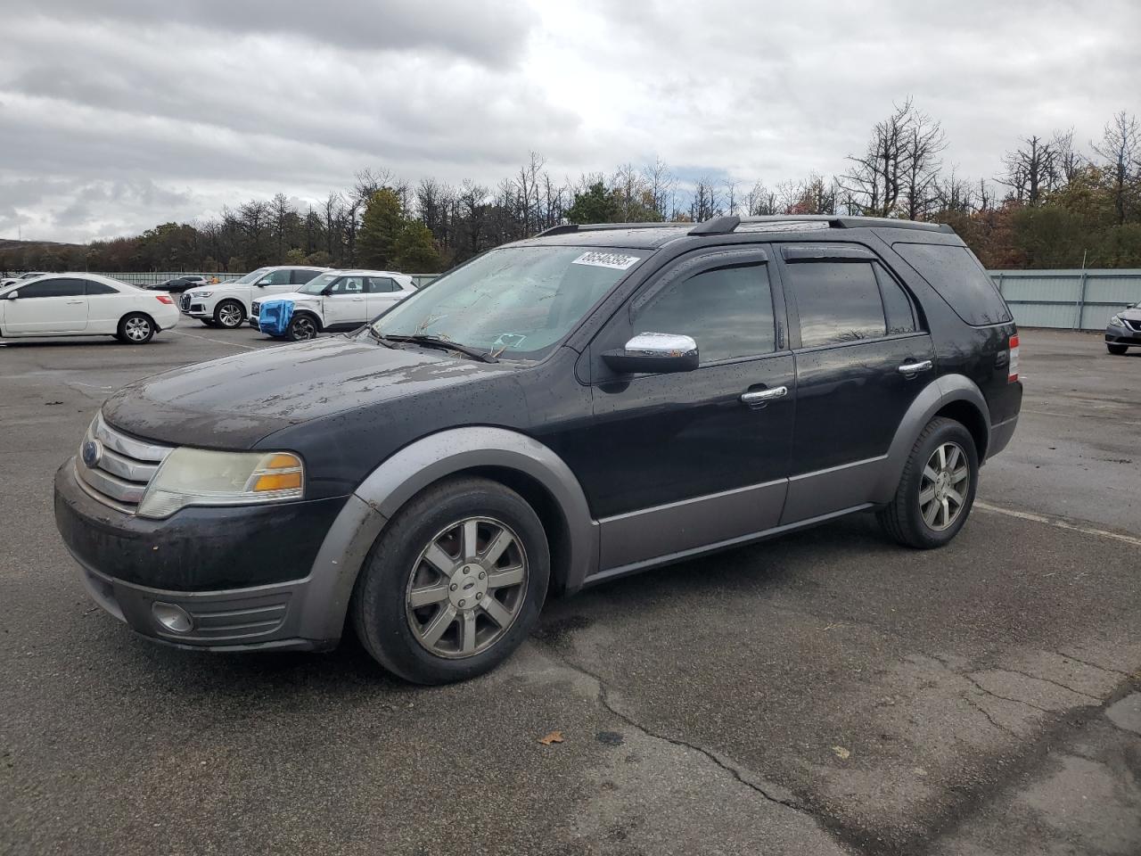 2008 Ford Taurus X SEL, VIN 1FMDK02W78GA39731 — Minor dents and scratches