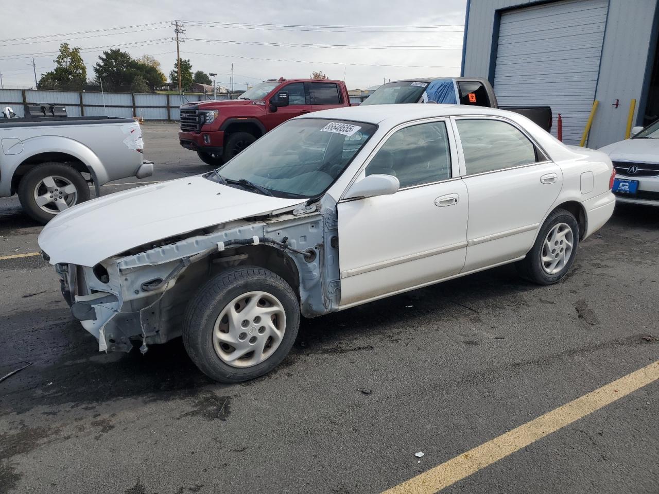 2000 Mazda 626 LX, VIN 1YVGF22C3Y5165341 — Front end