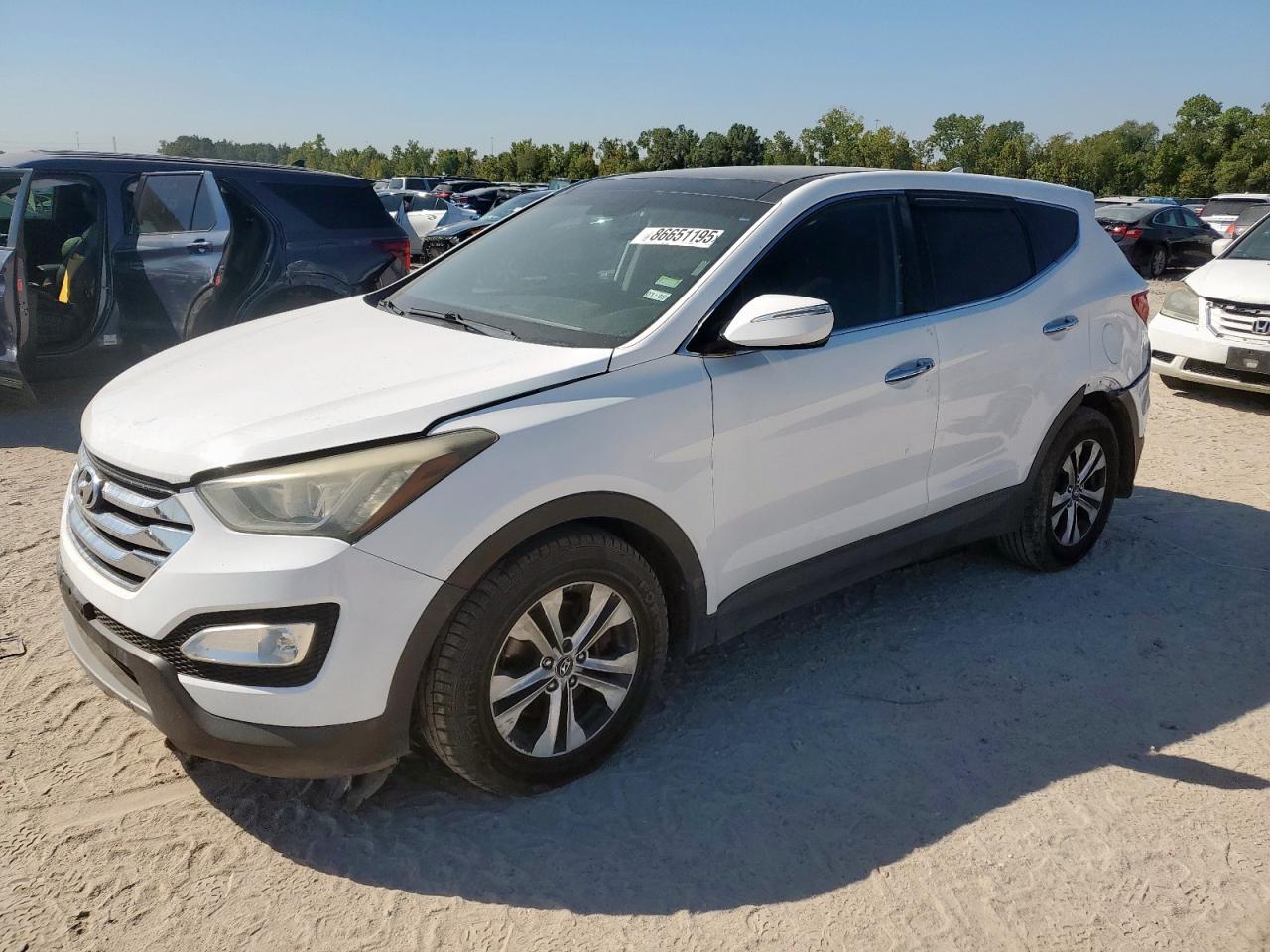 2013 Hyundai Santa Fe Sport, VIN 5XYZWDLA3DG088575 — Rear end