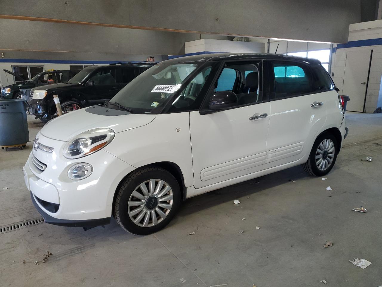 2014 FIAT 500L Easy, VIN ZFBCFABH9EZ001240 — Rear end
