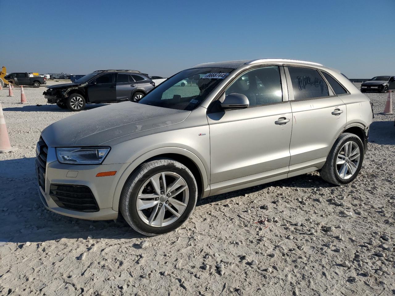 2018 Audi Q3 Premium, VIN WA1ECCFS3JR003876 — Rear end