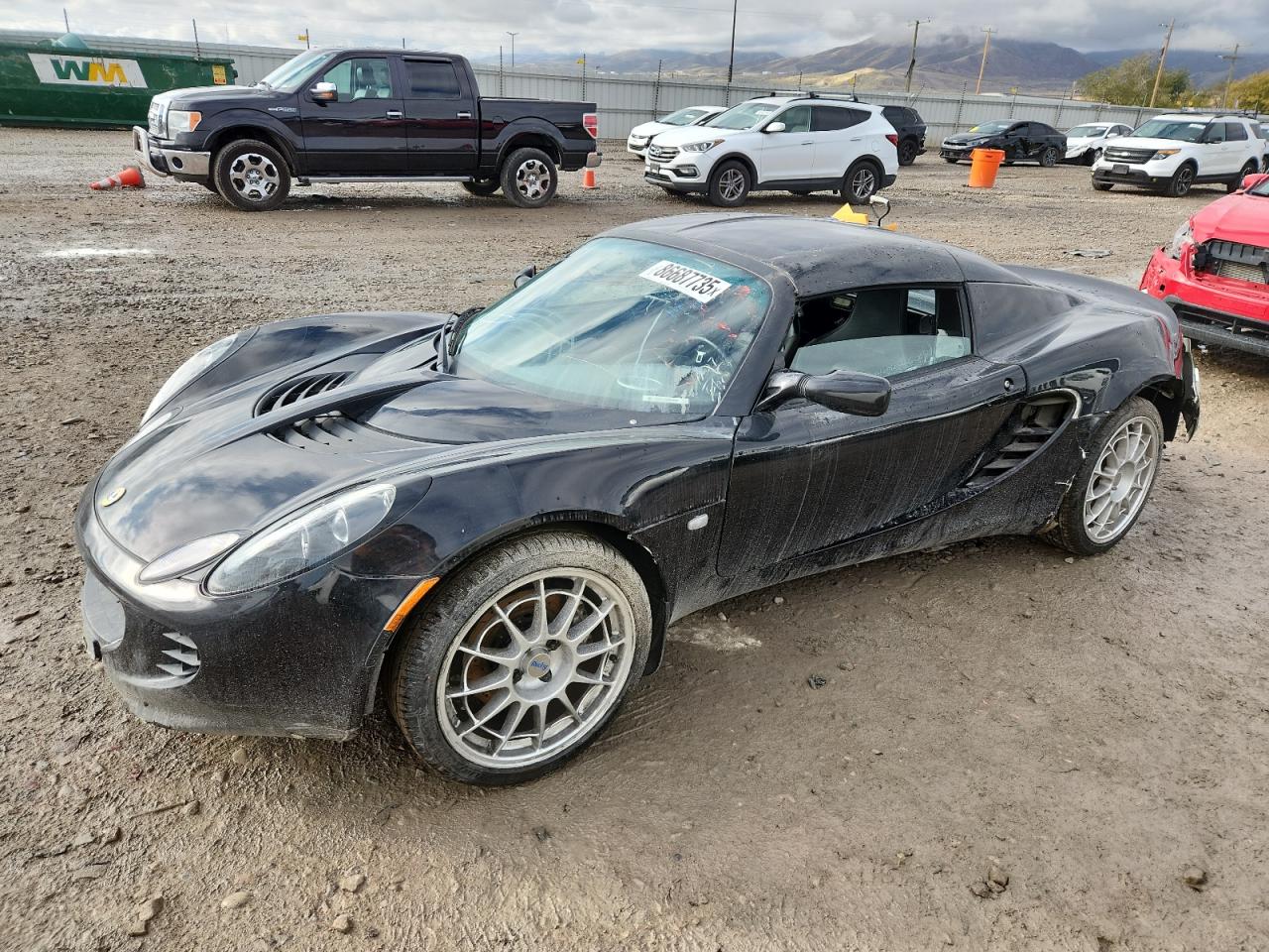 2007 Lotus Elise, VIN SCCPC11167HL32585 — Зад