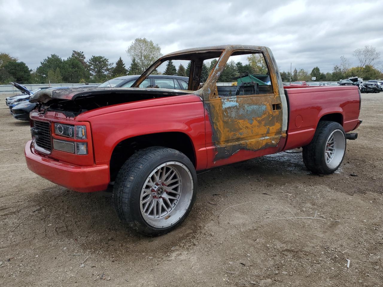 1997 GMC Sierra 1500, VIN 1GDEK14R6VZ542927 — Engine fire