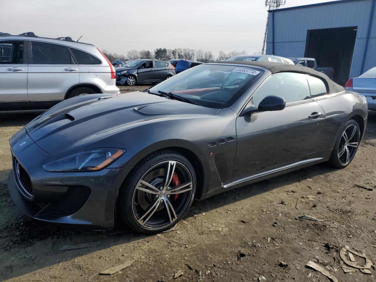 2015 Maserati GranTurismo Sport, VIN ZAM45VMA7F0131157 — Side