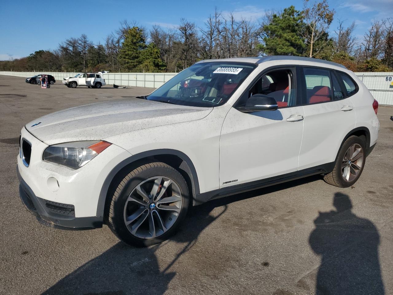 2015 BMW X1 xDrive28i, VIN WBAVL1C52FVY35083 — Rear end