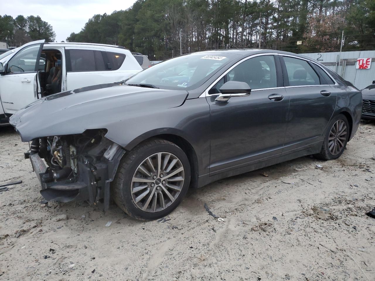 2017 Lincoln MKZ Select, VIN 3LN6L5DC8HR612859 — Rejected repair