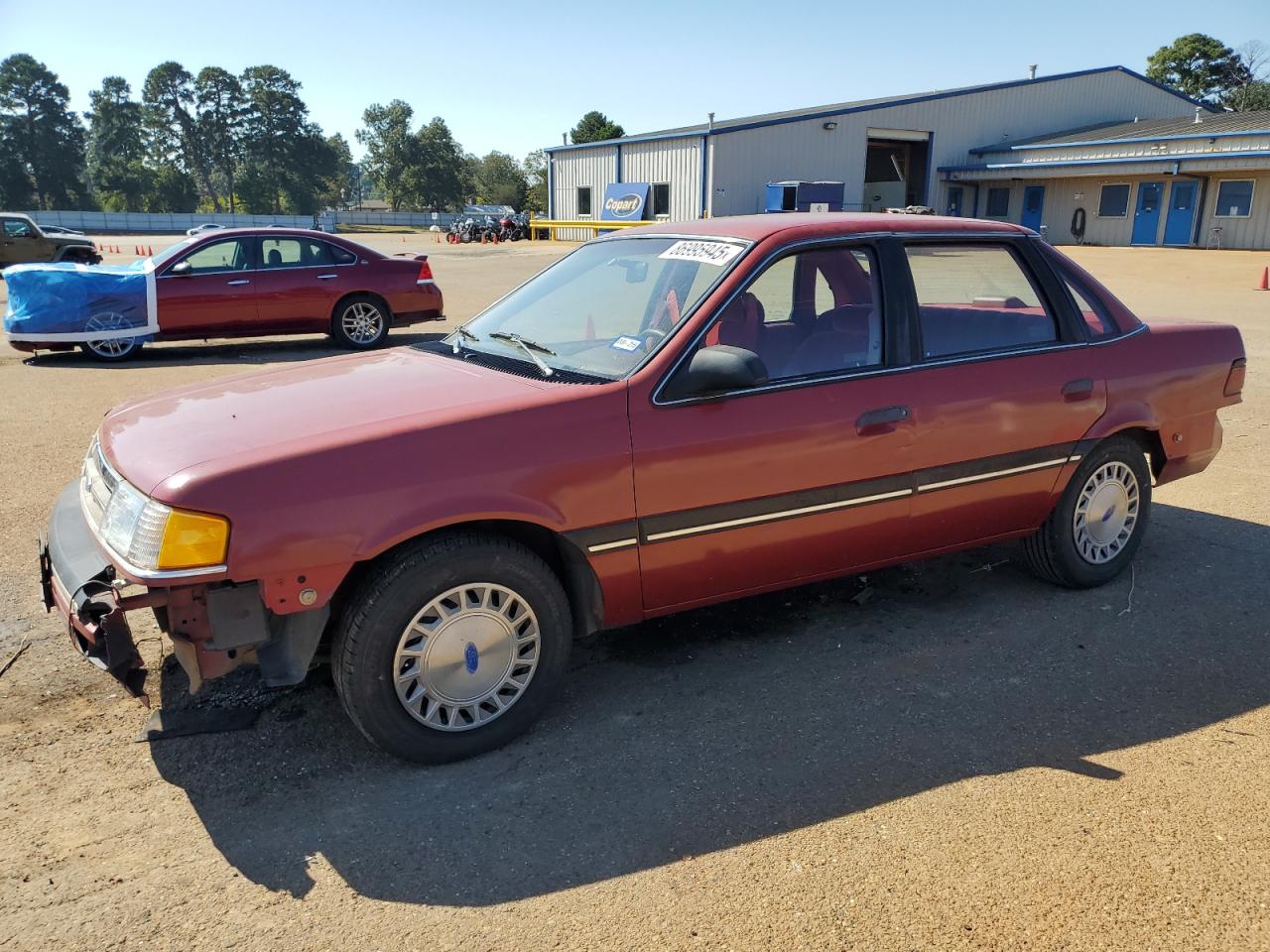 1989 Ford Tempo, VIN 1FAPP36X2KK220947 — Side
