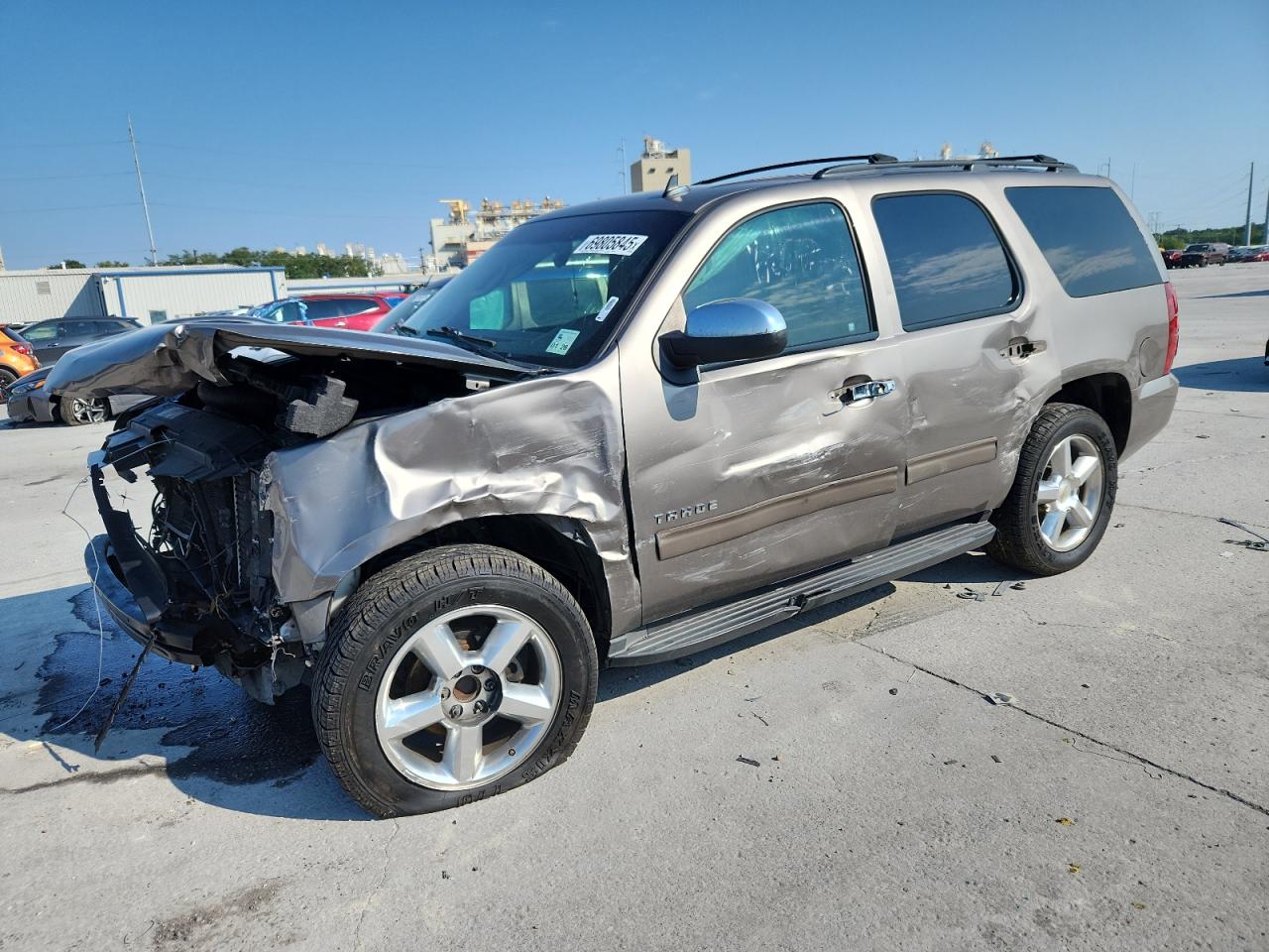 2012 Chevrolet Tahoe LS, VIN 1GNSCAE02CR203266 — Front end