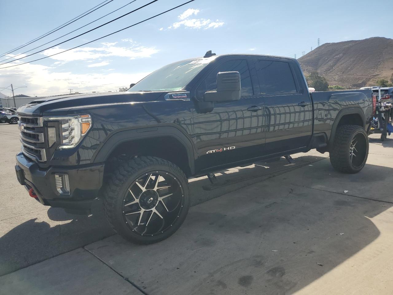 2022 GMC Sierra 2500HD AT4, VIN 1GT49PEY6NF203008 — Minor dents and scratches