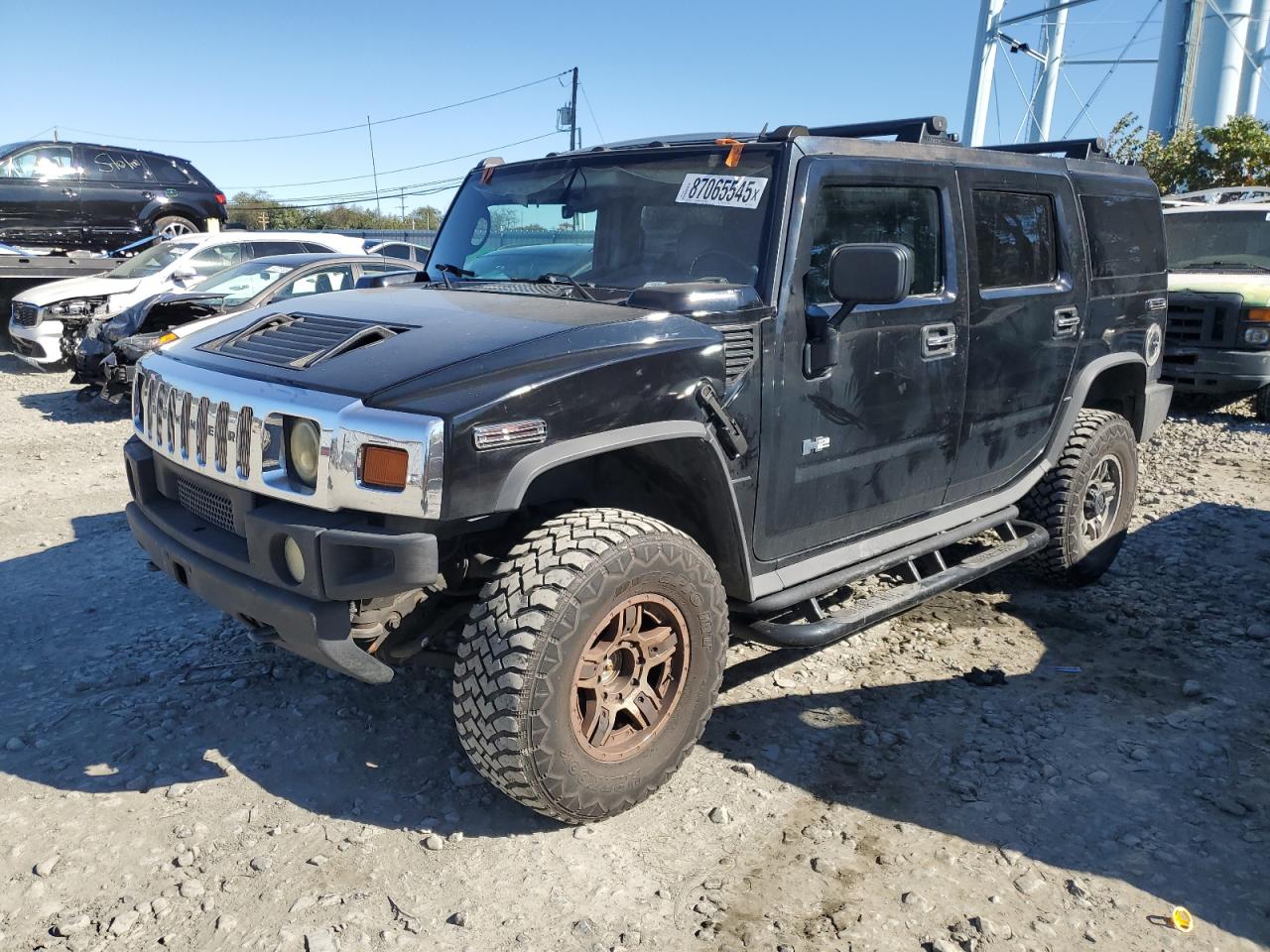 2005 Hummer H2 SUV, VIN 5GRGN23UX5H111169 — Мелкие вмятины и царапины