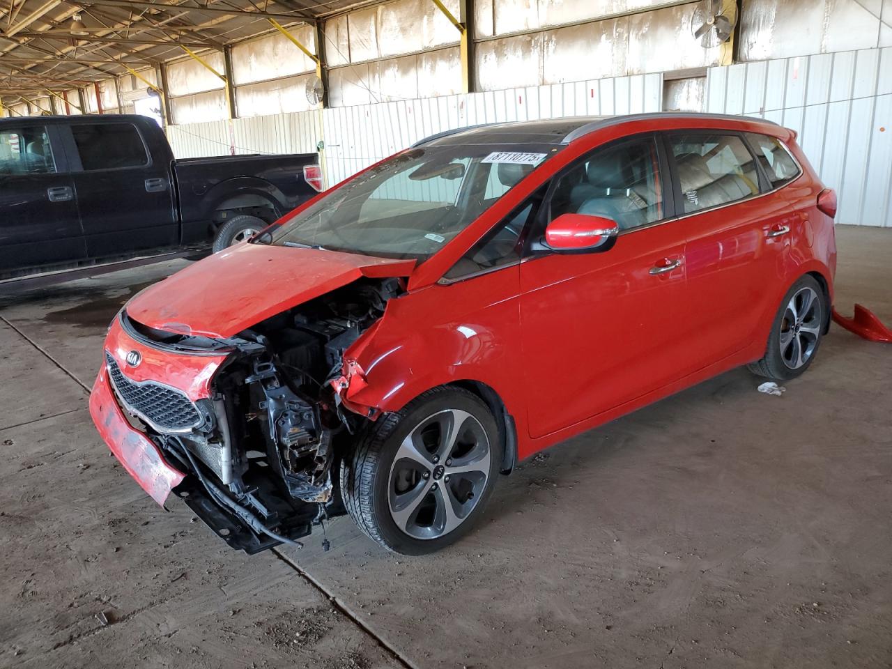 2015 Kia Rondo EX, VIN KNAHU8A30F7122921 — Front end