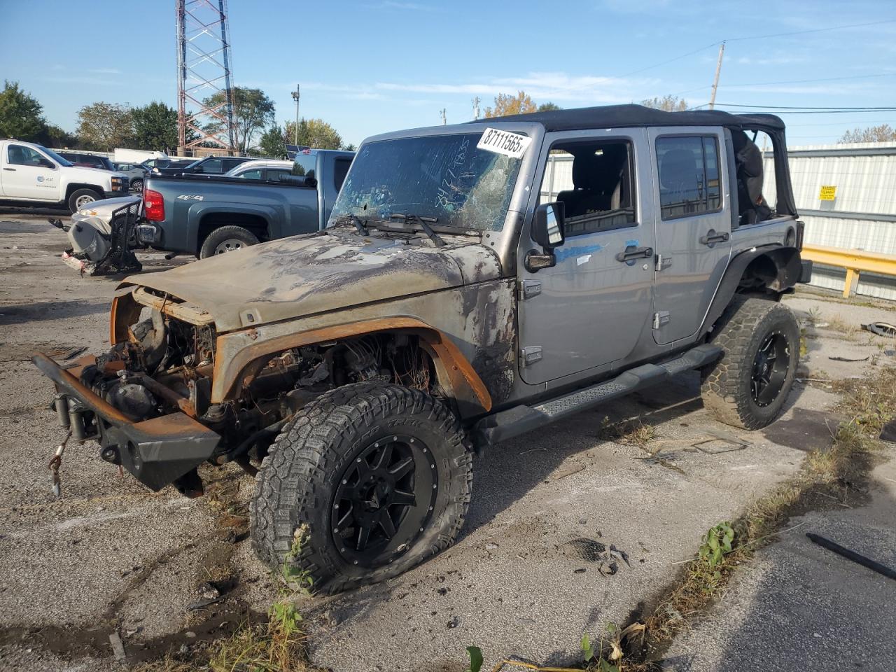 2014 Jeep Wrangler Unlimited Sahara, VIN 1C4BJWEG0EL233817 — Engine fire