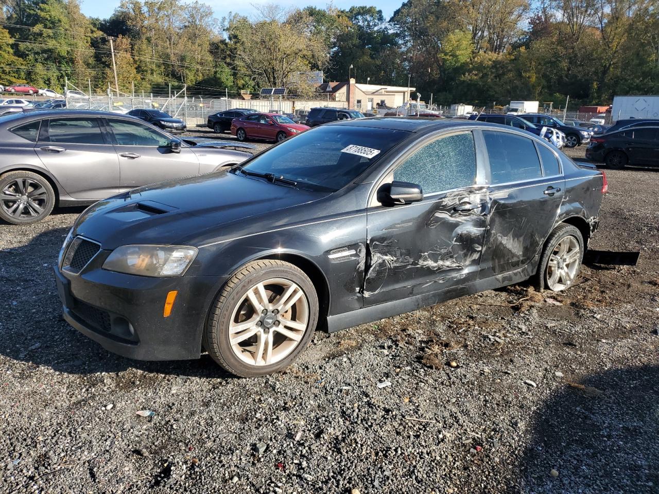 2009 Pontiac G8, VIN 6G2ER577X9L155363 — Side