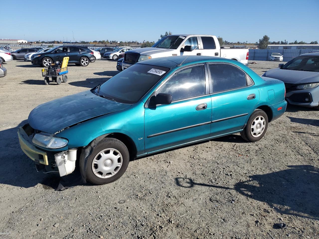 1996 Mazda Protege DX, VIN JM1BB1417T0332534 — Перед