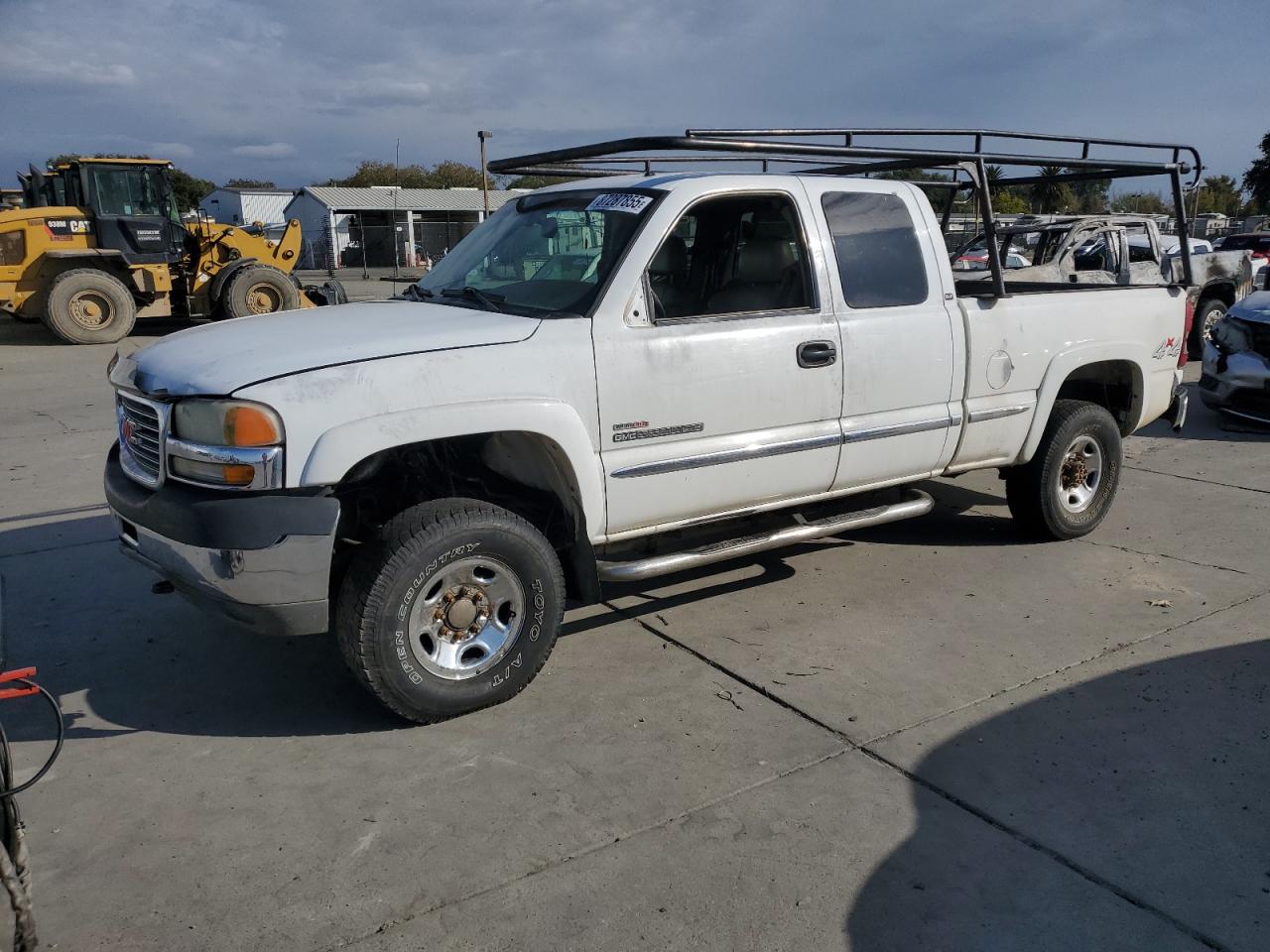 2002 GMC Sierra 2500HD SLE, VIN 1GTHK29112E231077 — Vandalism