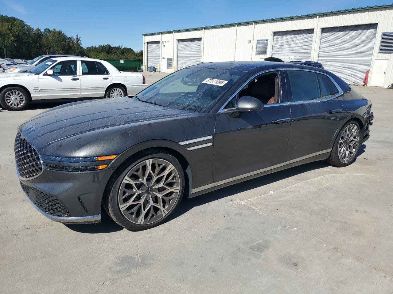 2023 Genesis G90 e-SC, VIN KMTFC4SD6PU029919 — Зад