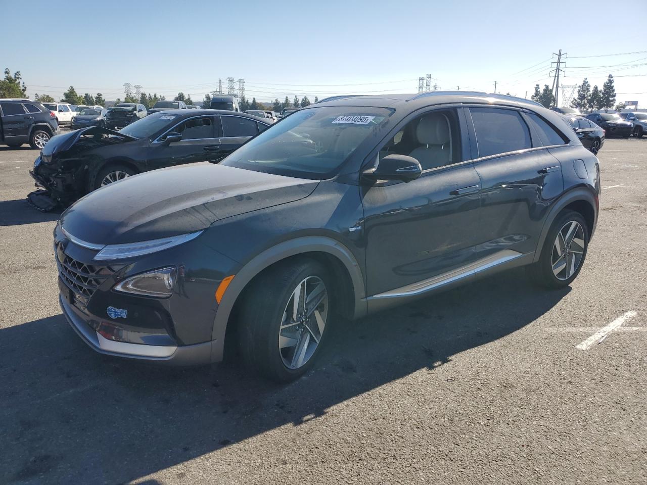 2021 Hyundai NEXO Limited, VIN KM8J84A63MU012998 — Side