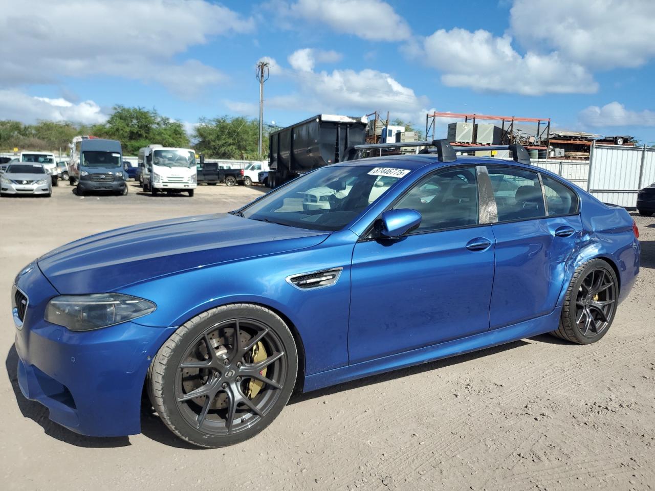 2014 BMW M5, VIN WBSFV9C57ED593453 — Бок