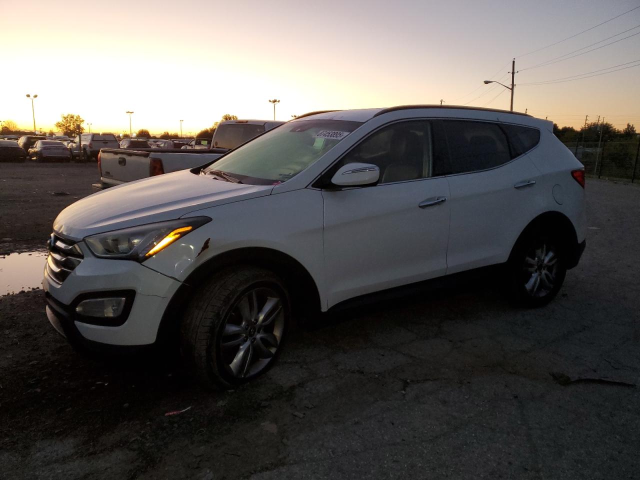 2013 Hyundai Santa Fe Sport, VIN 5XYZUDLA9DG082611 — Vandalism