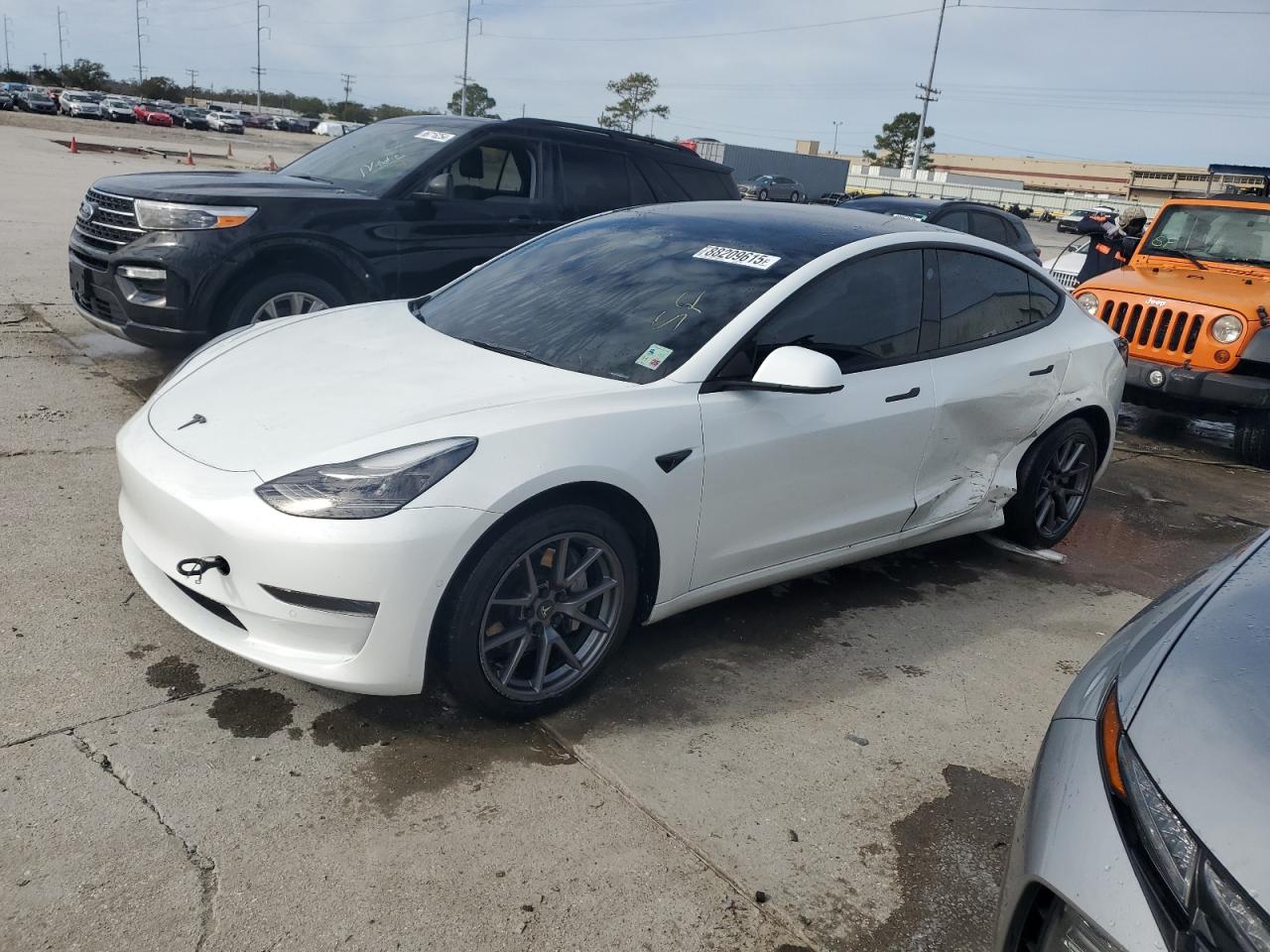2022 Tesla Model 3, VIN 5YJ3E1EA7NF314128 — Side