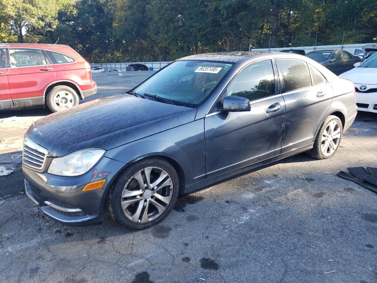 2013 Mercedes-Benz C 250 Sport, VIN WDDGF4HB8DR285497 — Side