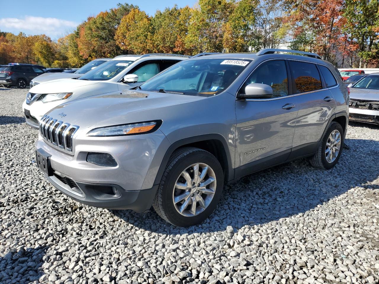 2015 Jeep Cherokee Limited, VIN 1C4PJMDSXFW717266 — Бок