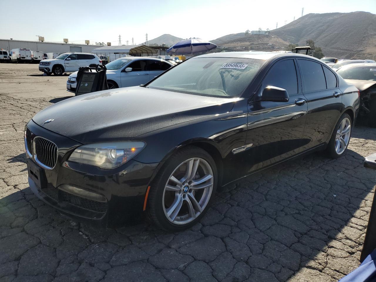 2011 BMW 7 Series 750i, VIN WBAKA8C5XBCY36358 — Minor dents and scratches