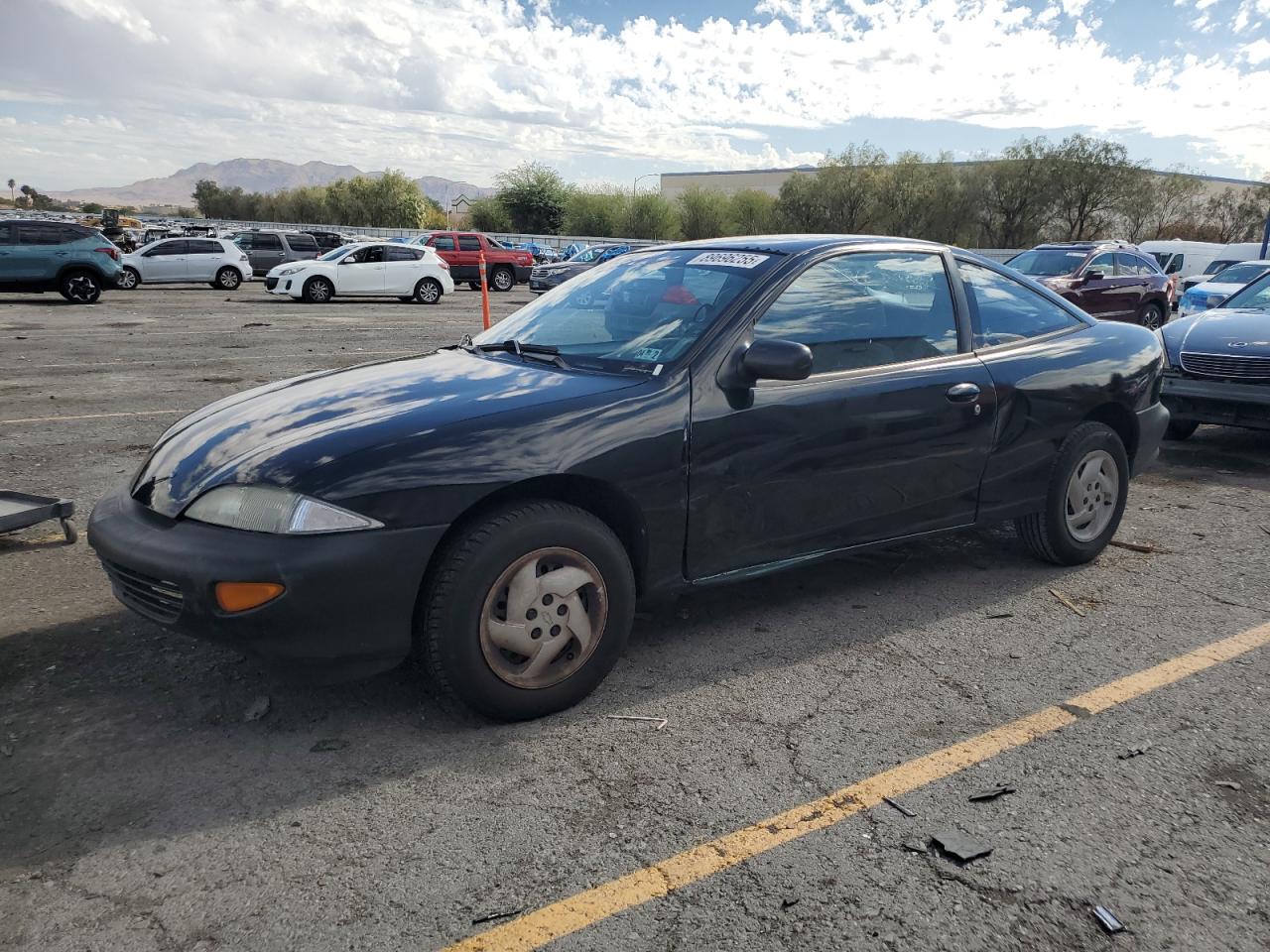 1999 Chevrolet Cavalier, VIN 1G1JC124XX7176470 — Side