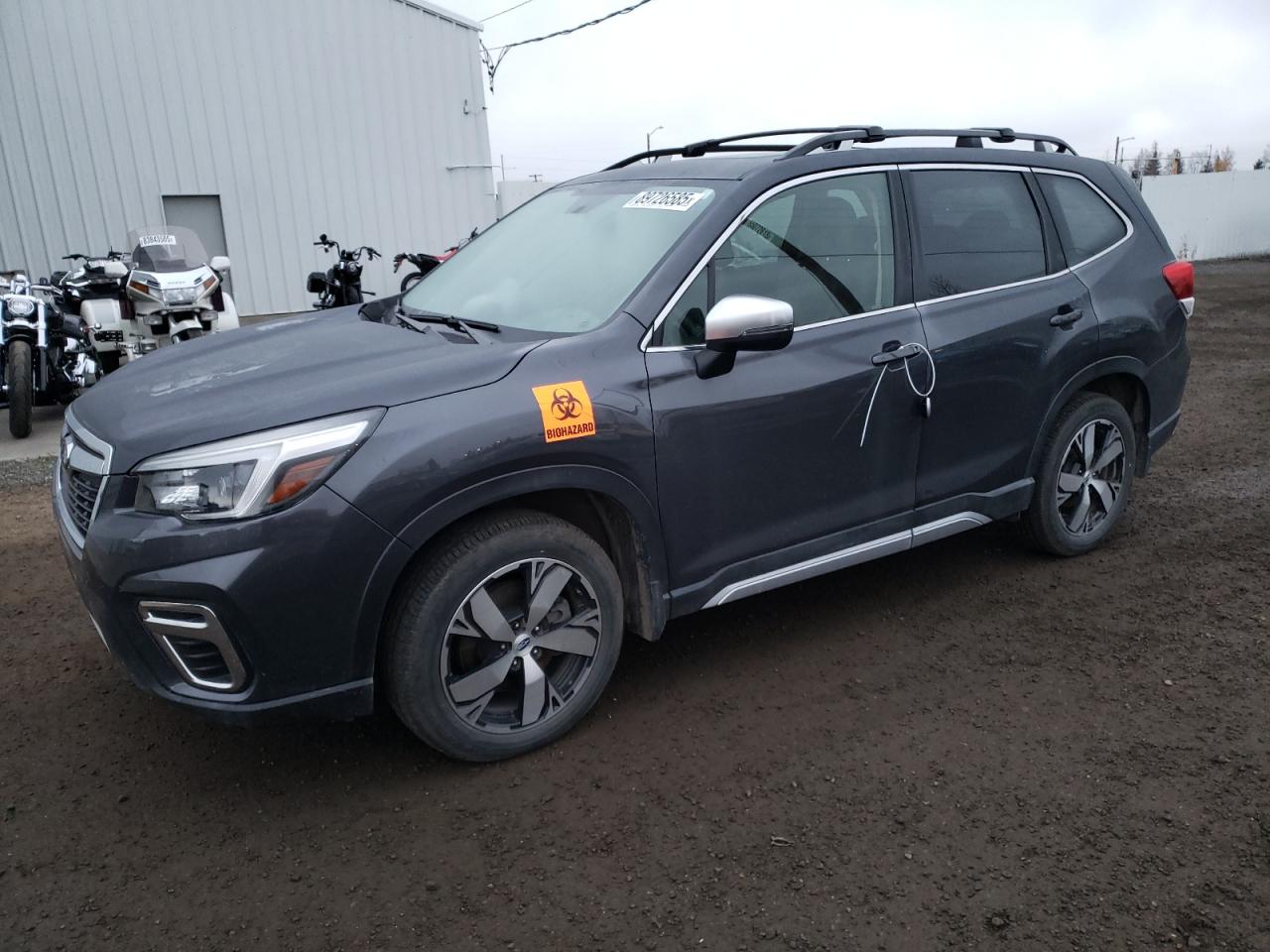 2021 Subaru Forester Touring, VIN JF2SKAXC0MH551157 — Фото с аукциона 1 of 13