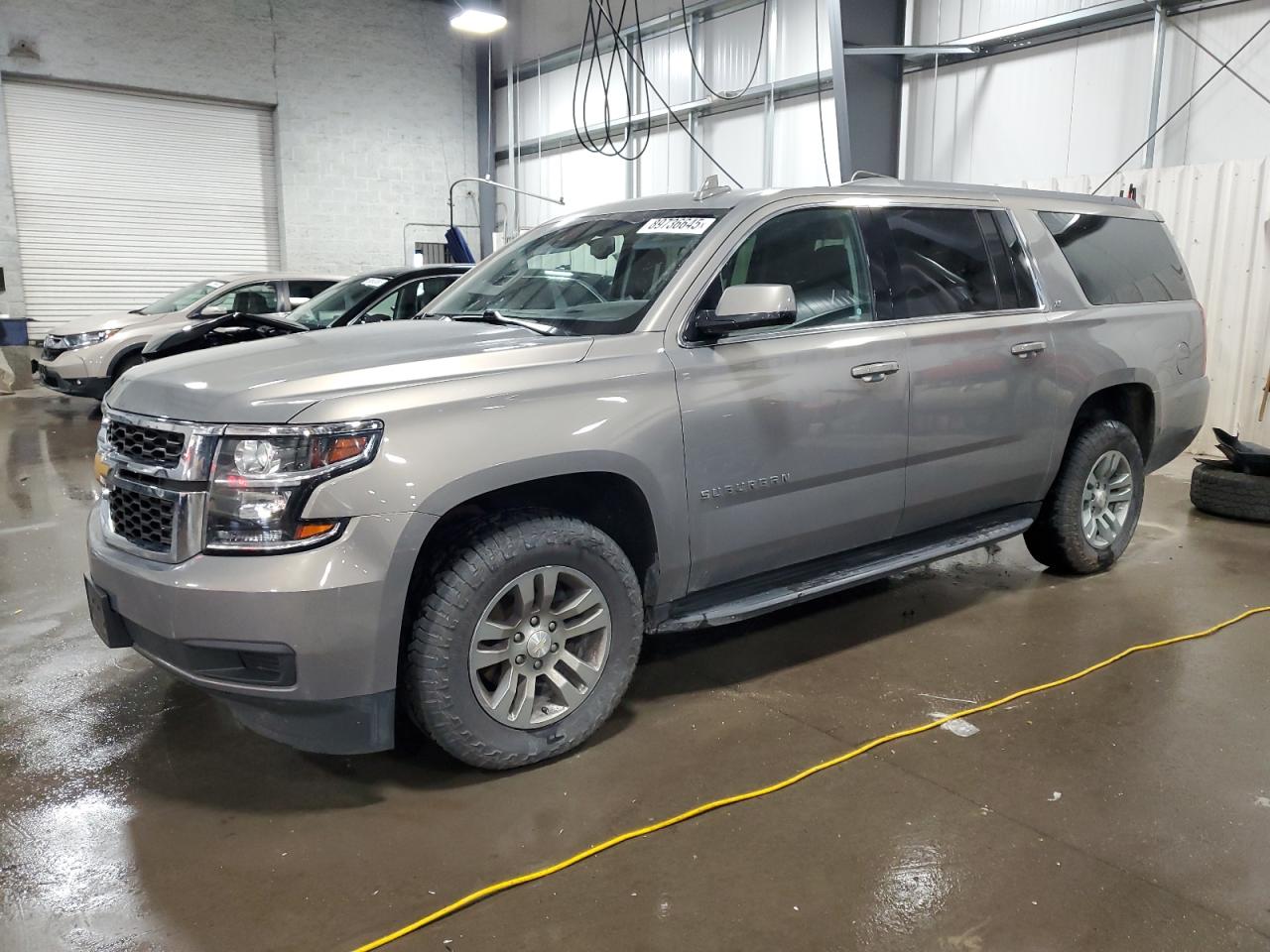 2018 Chevrolet Suburban LT, VIN 1GNSKHKC8JR400532 — Rear end