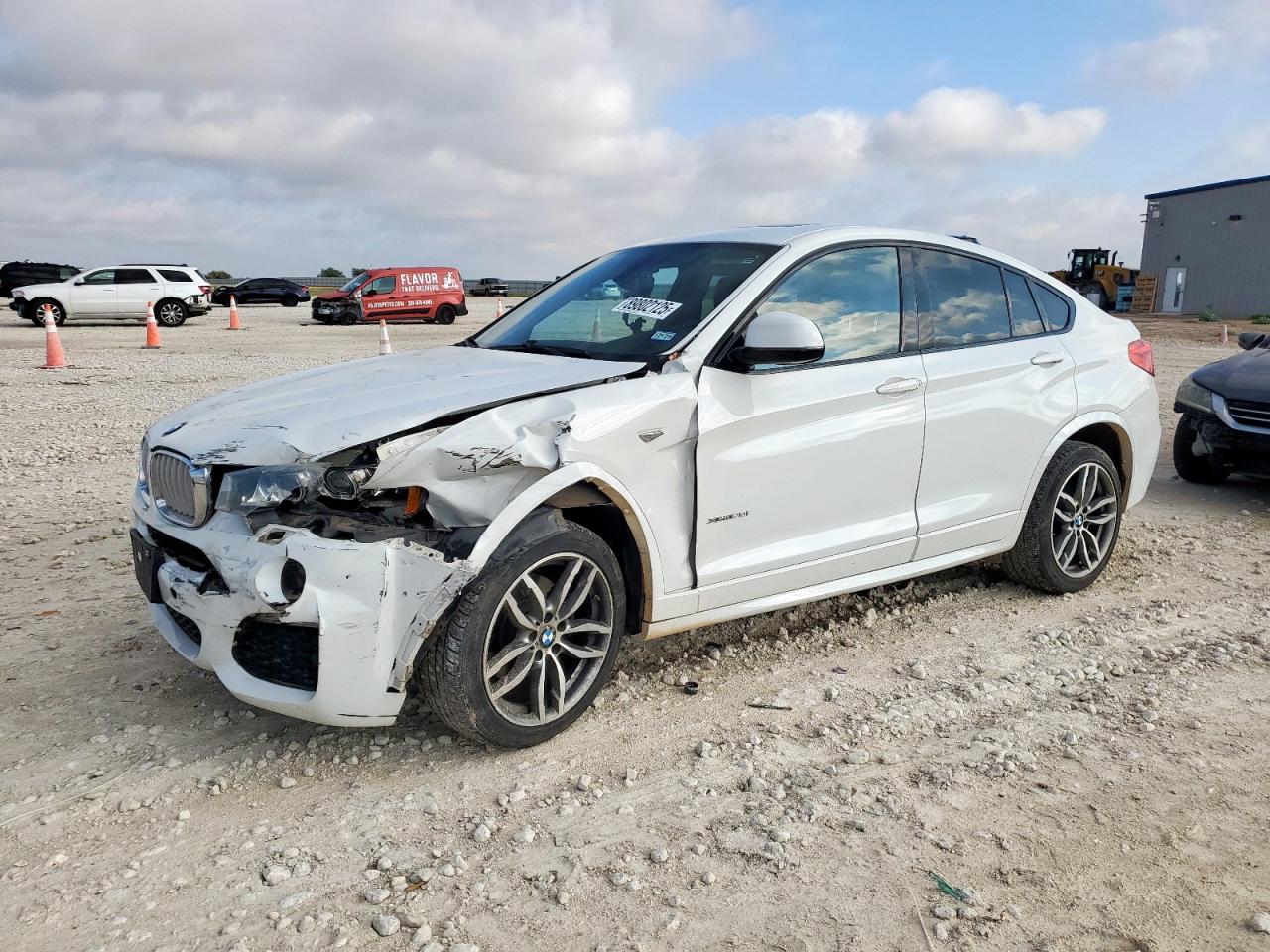 2016 BMW X4 xDrive28i, VIN 5UXXW3C59G0M90324 — Перед