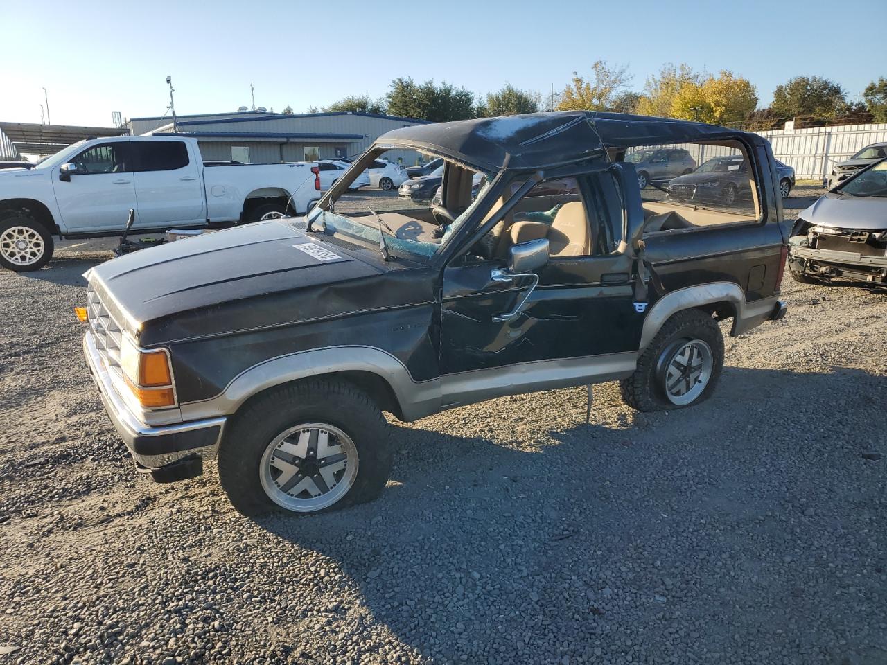 1990 Ford Bronco, VIN 1FMCU14T2LUB02629 — Side