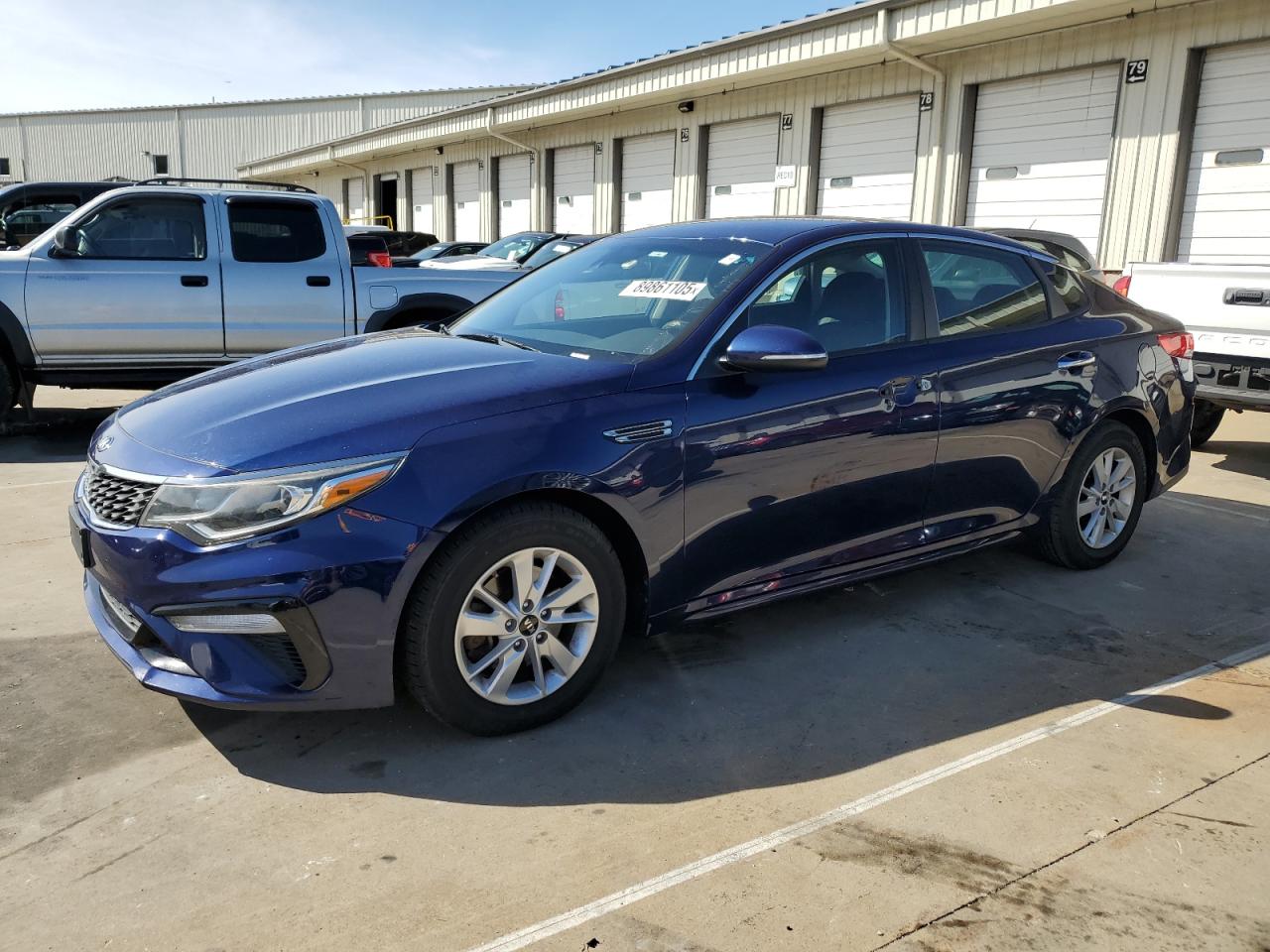 2019 Kia Optima LX, VIN 5XXGT4L3XKG281115 — Normal wear